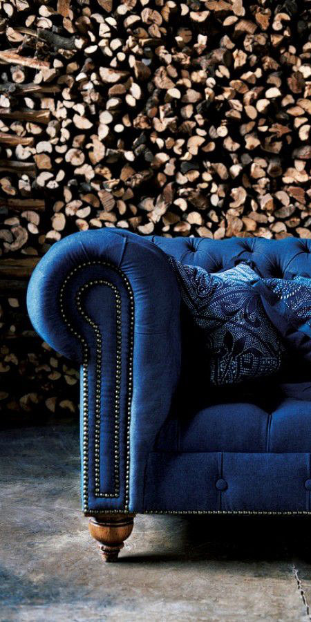 Indigo blue velvet Chesterfield couch