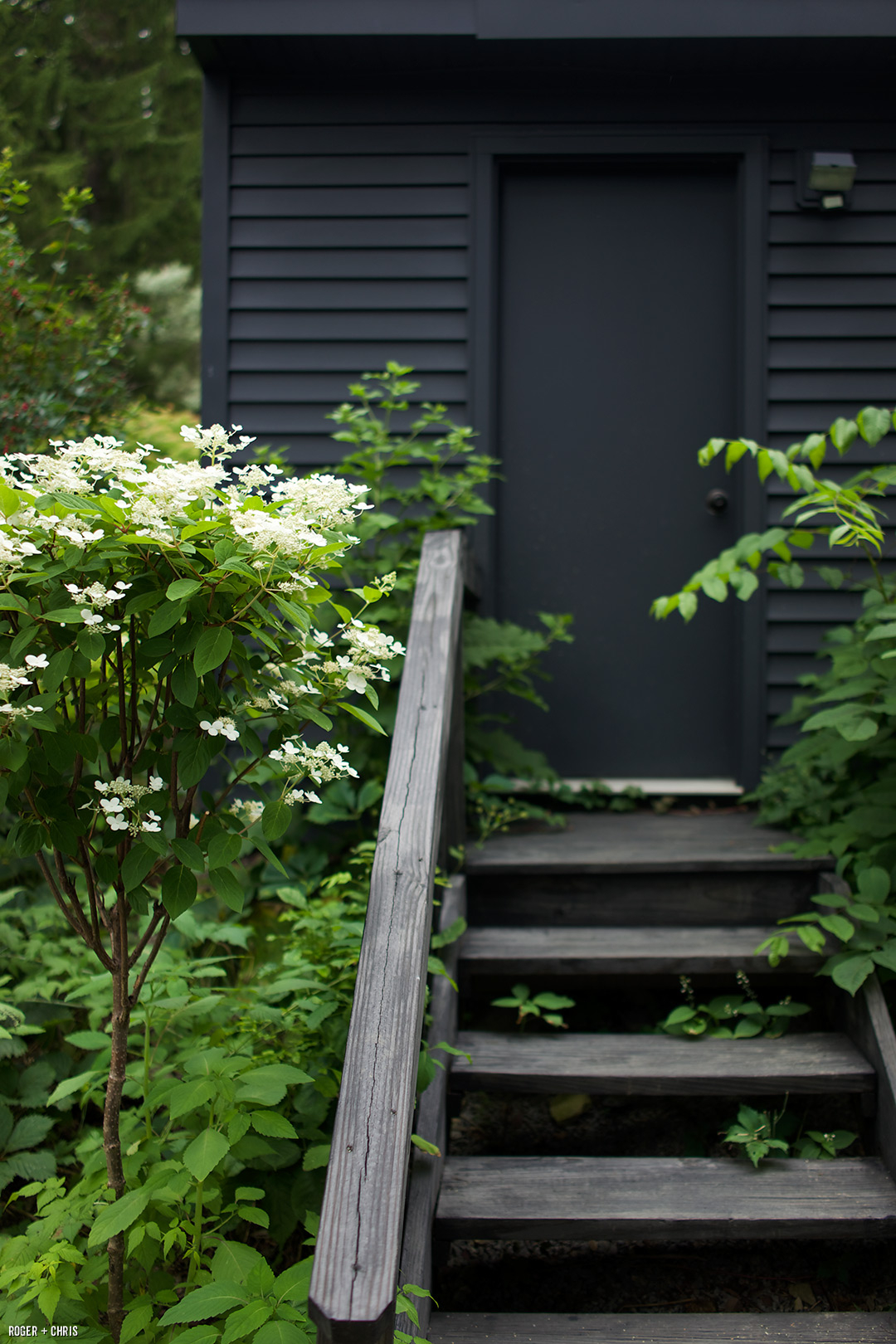 The steps to the garage were stained dark.